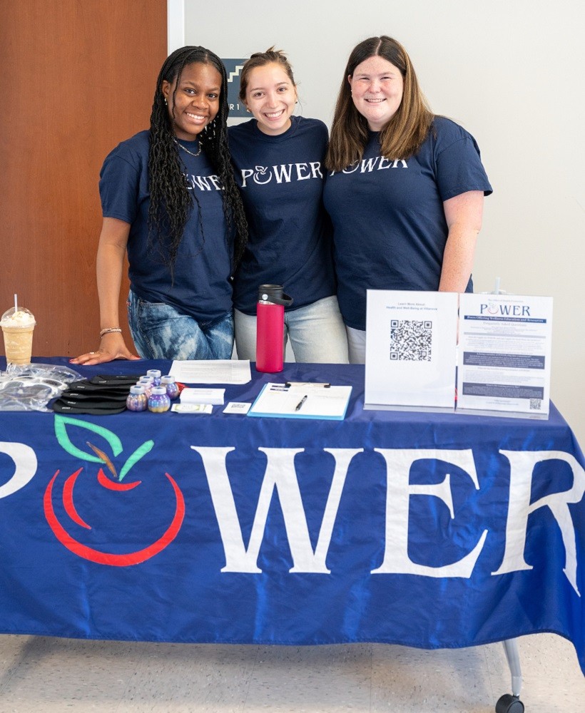 Students in the POWER student well-being program at an event